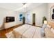 Main bedroom with hardwood floors and ensuite bathroom at 311 Silver Pine Dr, Lake Mary, FL 32746