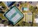 Aerial view of community tennis and pickleball courts at 3566 Tropical Seas Loop, Tavares, FL 32778