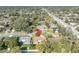 Drone image displays the real estate property including surrounding neighborhoods, streets and city views at 4130 Floralwood Ct, Orlando, FL 32812