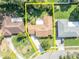 A bird's eye view of the home, highlighting its proximity to neighboring properties and street layout at 4130 Floralwood Ct, Orlando, FL 32812