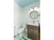 Small bathroom with a pedestal sink and toilet at 601 Sweetwater Club Blvd, Longwood, FL 32779