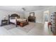 Spacious main bedroom with ensuite bath and walk-in closet at 601 Sweetwater Club Blvd, Longwood, FL 32779