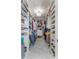 Large walk-in closet with ample shelving and hanging space at 601 Sweetwater Club Blvd, Longwood, FL 32779