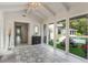 Sunlit entryway with a view of the pool and backyard at 601 Sweetwater Club Blvd, Longwood, FL 32779