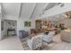 Bright and airy living room with an open floor plan and a view of the kitchen at 601 Sweetwater Club Blvd, Longwood, FL 32779