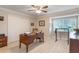 Home office with built-in desk, ample storage, and natural light at 601 Sweetwater Club Blvd, Longwood, FL 32779