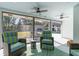 Bright sunroom overlooking the backyard pool at 601 Sweetwater Club Blvd, Longwood, FL 32779