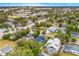 Aerial view of neighborhood, showcasing houses and trees at 631 Callahan St, Winter Park, FL 32789