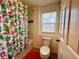 Bathroom with tub and shower at 6976 Church Lake St, Groveland, FL 34736