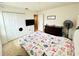 Bedroom with full-size bed and closet at 6976 Church Lake St, Groveland, FL 34736