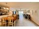 Open concept dining area and living room, featuring tile floors at 6976 Church Lake St, Groveland, FL 34736