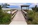 Scenic wooden pier overlooking the lake at 6976 Church Lake St, Groveland, FL 34736