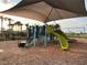 Playground with shaded structure and slide at 6976 Church Lake St, Groveland, FL 34736