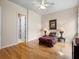 Bedroom with hardwood floors and window at 7718 Flemingwood Ct, Sanford, FL 32771