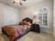 Bedroom with double closets, hardwood floors, and ceiling fan at 7718 Flemingwood Ct, Sanford, FL 32771