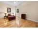 Bright bedroom with hardwood floors and a window at 7718 Flemingwood Ct, Sanford, FL 32771