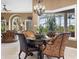 Charming breakfast nook with seating for four and a view to the outdoors at 7718 Flemingwood Ct, Sanford, FL 32771