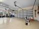 Spacious garage with overhead storage at 7718 Flemingwood Ct, Sanford, FL 32771