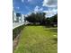 Open green space with lush grass and trees at 7770 Sandy Ridge Dr # 126, Reunion, FL 34747