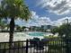 Relaxing resort-style pool with lounge chairs and umbrellas at 7770 Sandy Ridge Dr # 126, Reunion, FL 34747