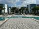 Stunning resort pool with spa and plenty of lounge chairs at 7770 Sandy Ridge Dr # 126, Reunion, FL 34747