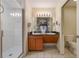 Bathroom with double vanity and large shower at 8101 Resort Village Dr # 31308, Orlando, FL 32821