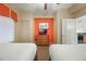Bedroom with two beds and built-in dresser at 8101 Resort Village Dr # 31308, Orlando, FL 32821