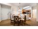 Bright dining area with view of entryway and kitchen at 8101 Resort Village Dr # 31308, Orlando, FL 32821