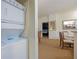 Stackable washer and dryer in a small laundry closet at 8101 Resort Village Dr # 31308, Orlando, FL 32821