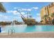 Large resort-style pool with a pirate ship water feature at 8101 Resort Village Dr # 31308, Orlando, FL 32821