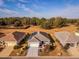 Aerial view of a home with solar panels and a large yard at 8134 Sw 78Th Terrace Rd, Ocala, FL 34476