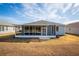 Home exterior showcasing a screened patio at 8134 Sw 78Th Terrace Rd, Ocala, FL 34476