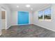 Bright bedroom with large window and blue accent wall at 8134 Sw 78Th Terrace Rd, Ocala, FL 34476