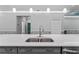 Modern kitchen island with double sink and quartz countertop at 8134 Sw 78Th Terrace Rd, Ocala, FL 34476