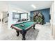 Game room with pool table and adjacent bar at 8953 Hilton Ridge Ave, Kissimmee, FL 34747