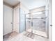 Large walk-in shower with tiled walls at 8953 Hilton Ridge Ave, Kissimmee, FL 34747