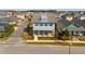 Two-story home with blue shutters and a front porch at 9203 Neher St, Orlando, FL 32827