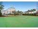 Green basketball court with clear markings at 9203 Neher St, Orlando, FL 32827