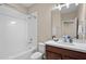 Clean bathroom with a single vanity and shower at 9203 Neher St, Orlando, FL 32827