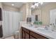 Double vanity bathroom with a shower/tub combo at 9203 Neher St, Orlando, FL 32827