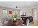 Bright dining area with kitchen island and seating for four at 9203 Neher St, Orlando, FL 32827