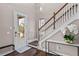 Entryway with staircase, hardwood floors, and decor at 9203 Neher St, Orlando, FL 32827