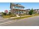 Two-story house with blue shutters and landscaped yard at 9203 Neher St, Orlando, FL 32827