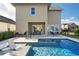 Resort-style pool with patio furniture and a covered lanai at 9203 Neher St, Orlando, FL 32827