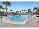 Large community pool with multiple areas for swimming and lounging at 9203 Neher St, Orlando, FL 32827