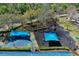 Aerial view of community recreation area with a covered playground and basketball court at 1003 Beckstrom Dr, Oviedo, FL 32765