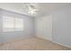 Bedroom with neutral carpeting and double doors at 1163 Queen Elaine Dr, Casselberry, FL 32707