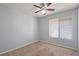 Bedroom featuring neutral carpeting and a window at 1163 Queen Elaine Dr, Casselberry, FL 32707