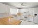 White kitchen with wood countertops and appliances at 1163 Queen Elaine Dr, Casselberry, FL 32707
