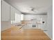 Efficient kitchen, white cabinets, wood countertops at 1163 Queen Elaine Dr, Casselberry, FL 32707